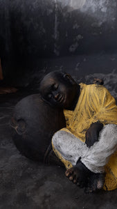 Hand-Painted Sleeping Buddha on a Cloth Sack