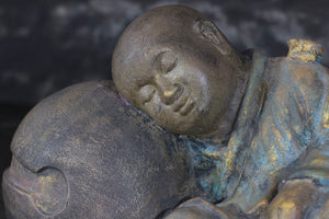 Hand-Painted Sleeping Buddha on a Cloth Sack