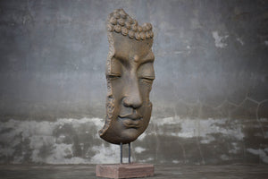 Mask-Shaped Buddha Sculpture on a Stand