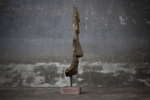 Mask-Shaped Buddha Sculpture on a Stand